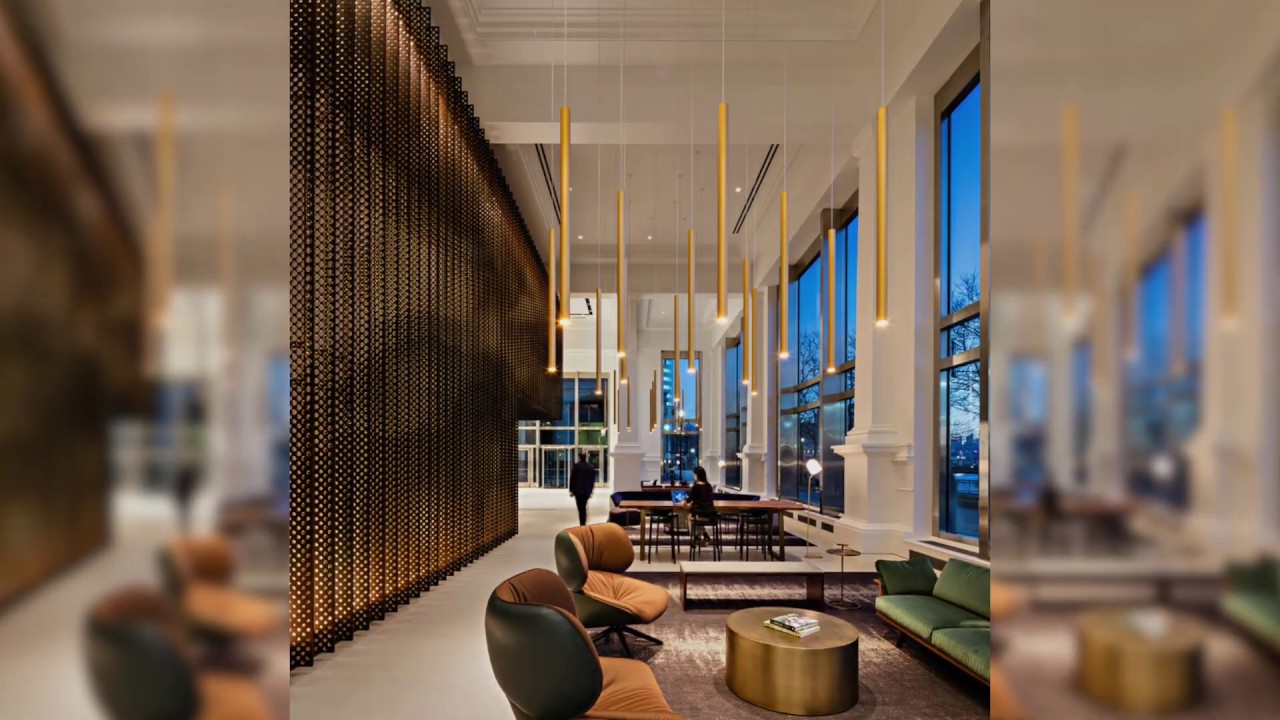 Read more about the article Lindsley Lighting: Gold Reed Pendant in a Stunning Lobby